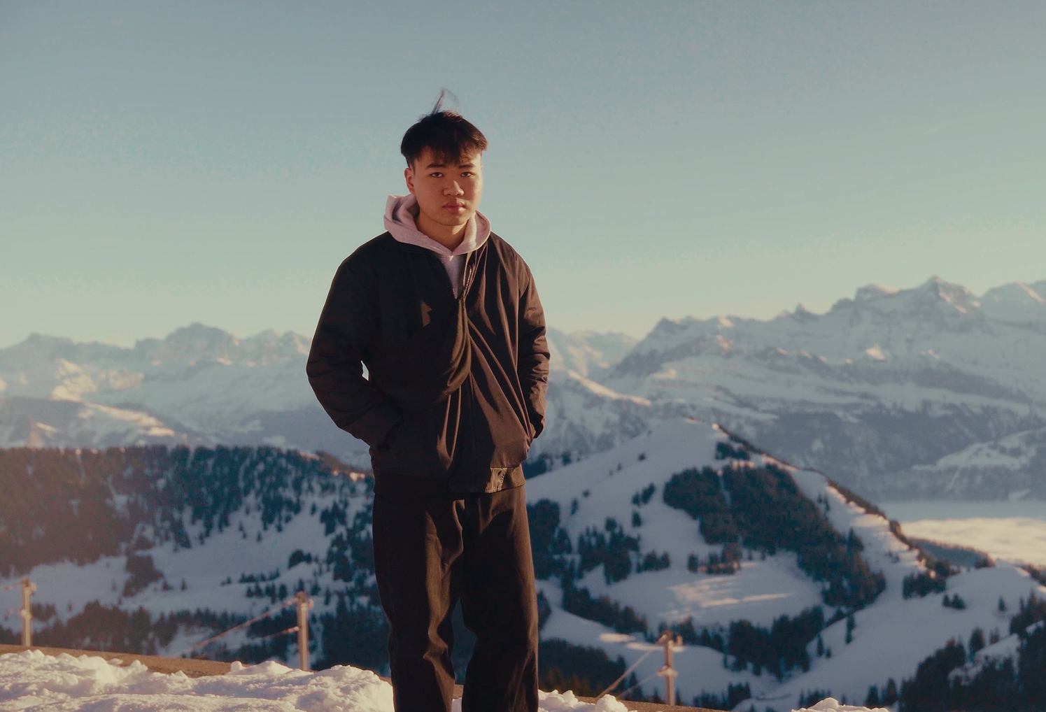 Thanh standing in the mountains